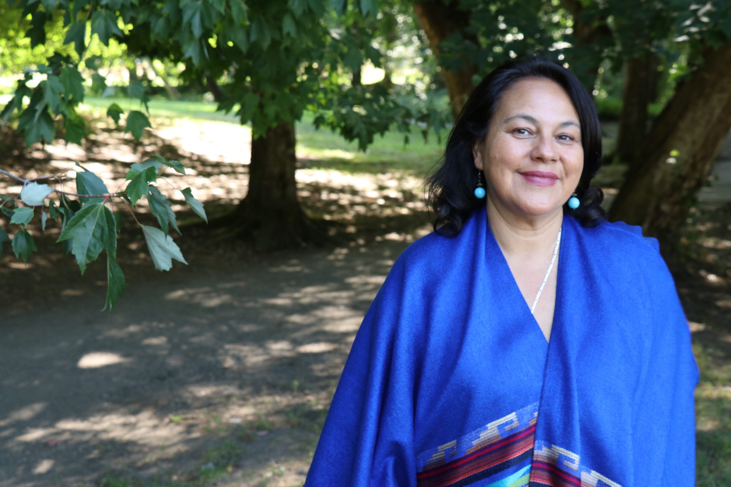 Public health innovator Paola Ardiles speaking and facilitating in community and university spaces.